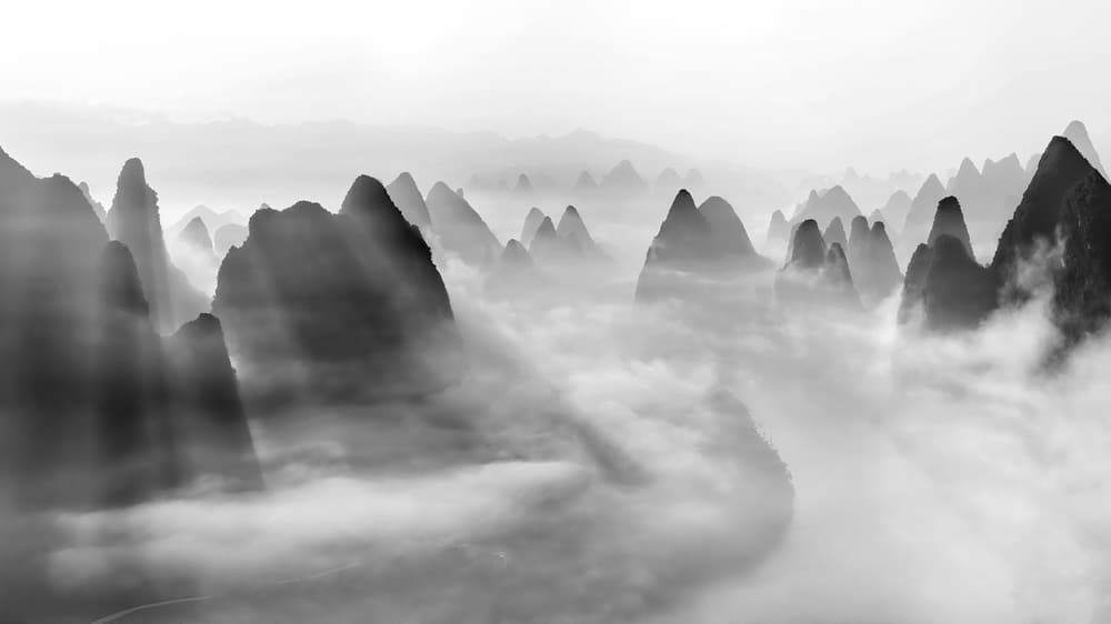 Light Rays Over Misty Peaks by Hua Zhu — canvas wall art