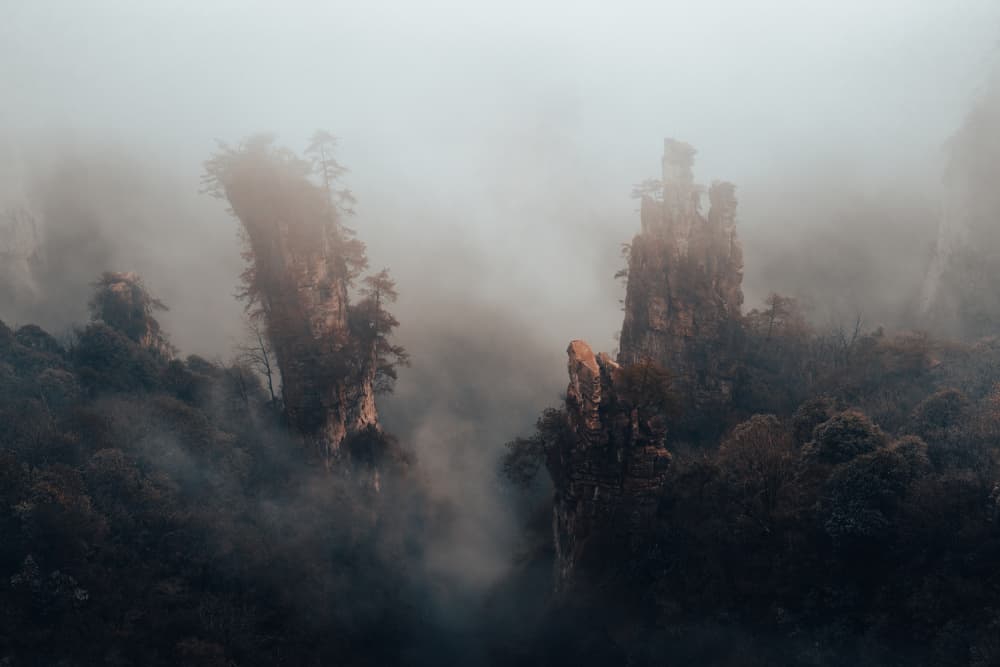 Majestic Foggy Peaks by Aidong Ning — canvas wall art