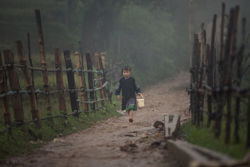 Misty Path Child by Sarawut Intarob — canvas wall art