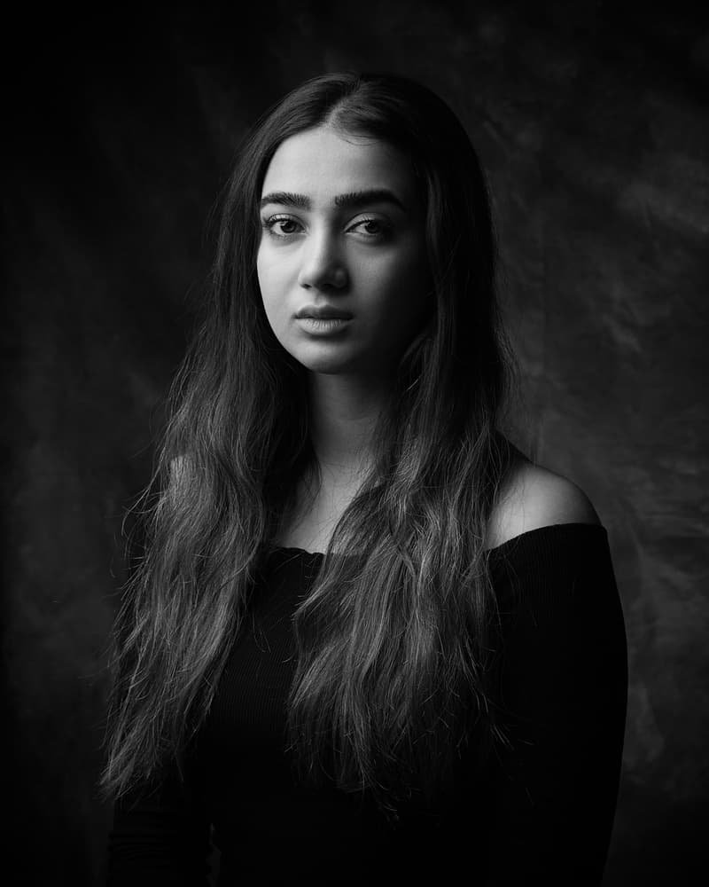 Contemplative Young Woman by Mehdi Mokhtari — canvas wall art