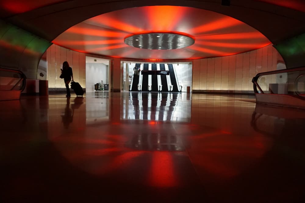 Red Lit Airport Passage by Rose Ungvari — canvas wall art