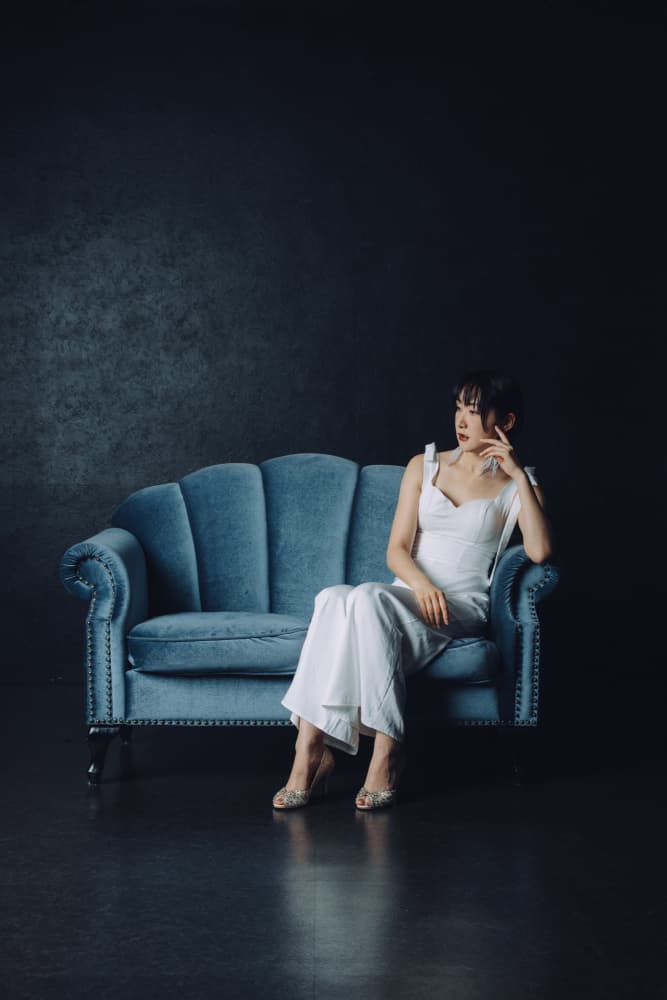 Elegant Woman Blue Sofa by h112o1 — canvas wall art
