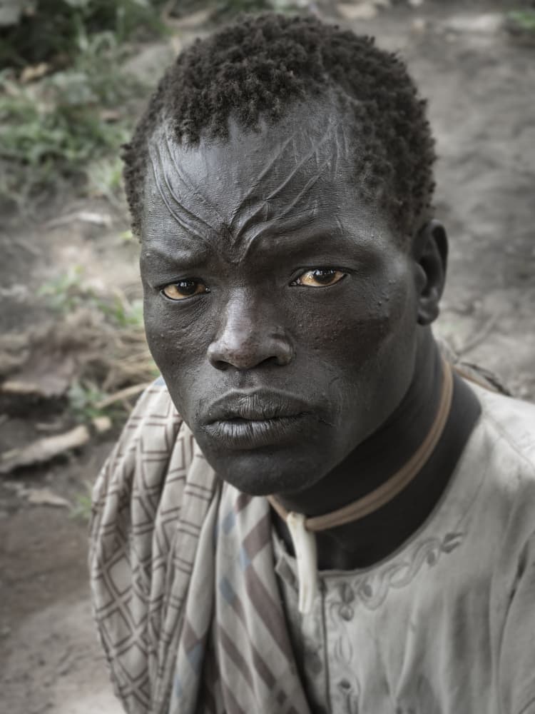 Man With Tribal Scars by Elena Molina — canvas wall art