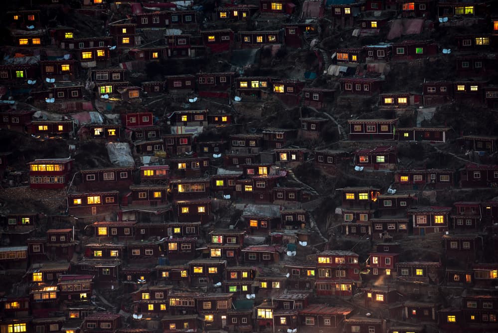 Glowing Mountain Homes by Sarawut Intarob — canvas wall art