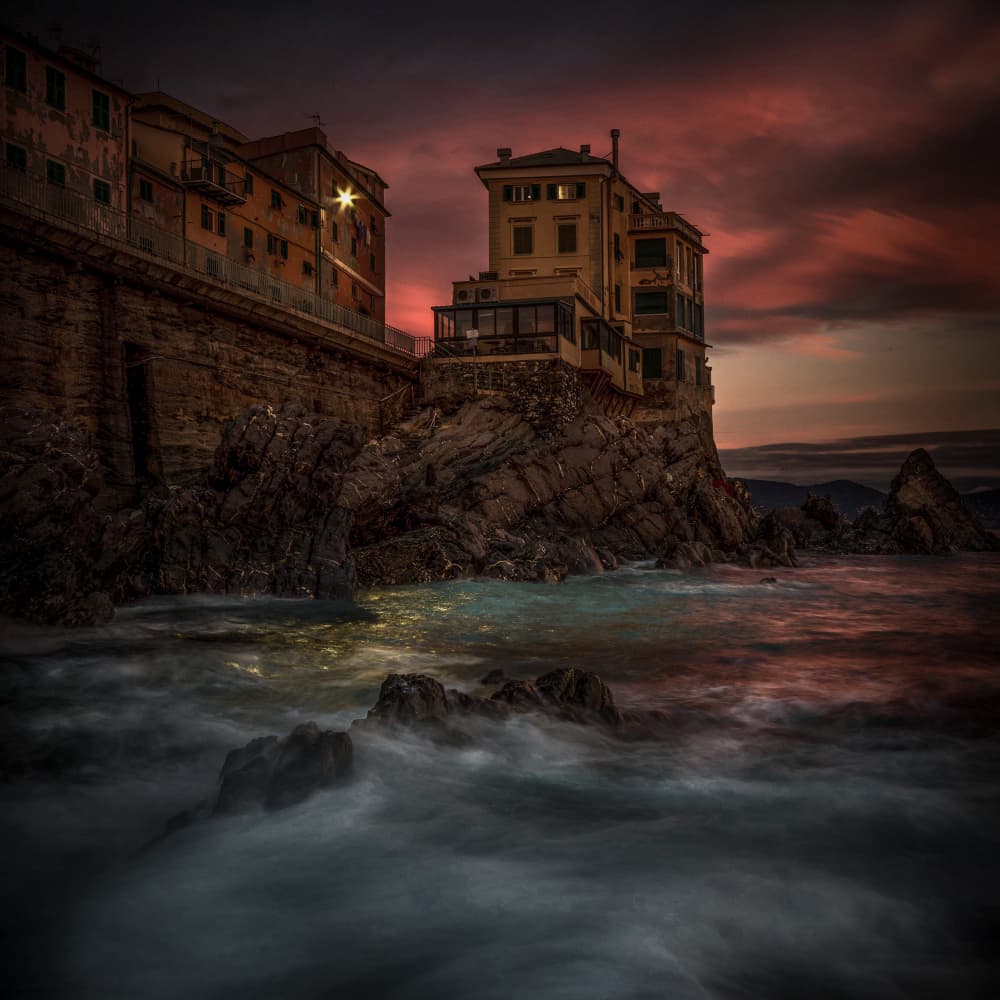 Evening Glow Coastal Town by Alessandro Traverso — canvas wall art
