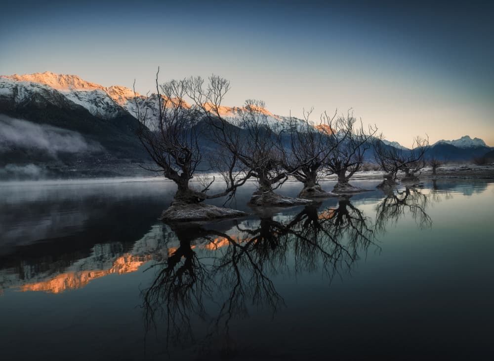 Winter Lake Reflections by Gu and Hongchao — canvas wall art