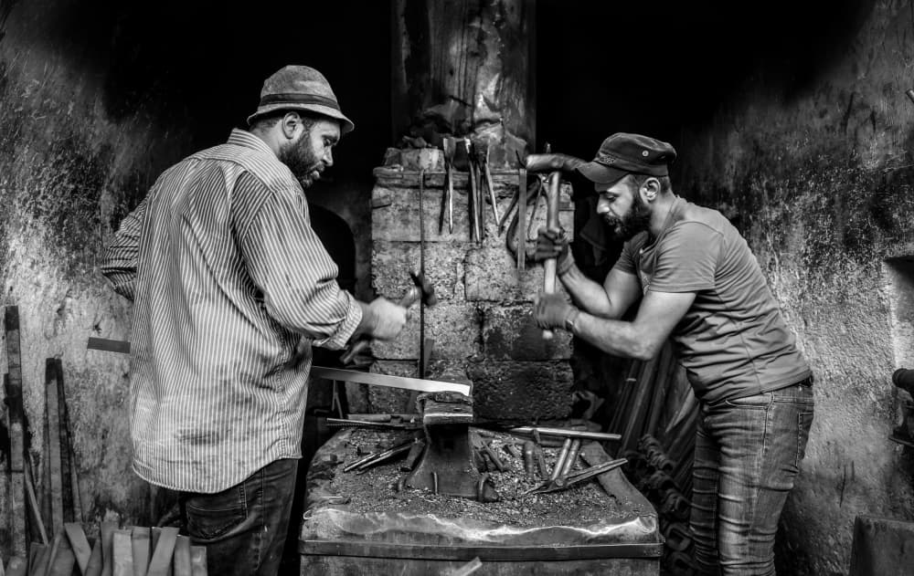 Artisan Blacksmiths At Work by Bashar Alsofey — canvas wall art
