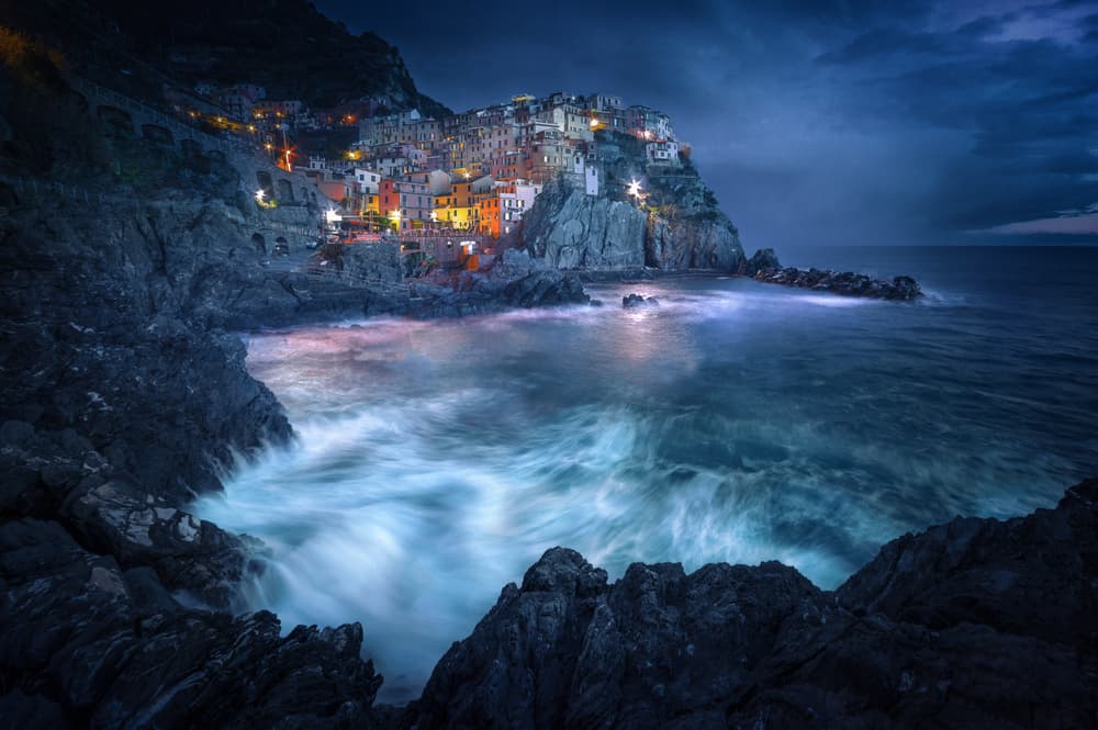 Glowing Coastal Village Night by Alessandro Traverso — canvas wall art