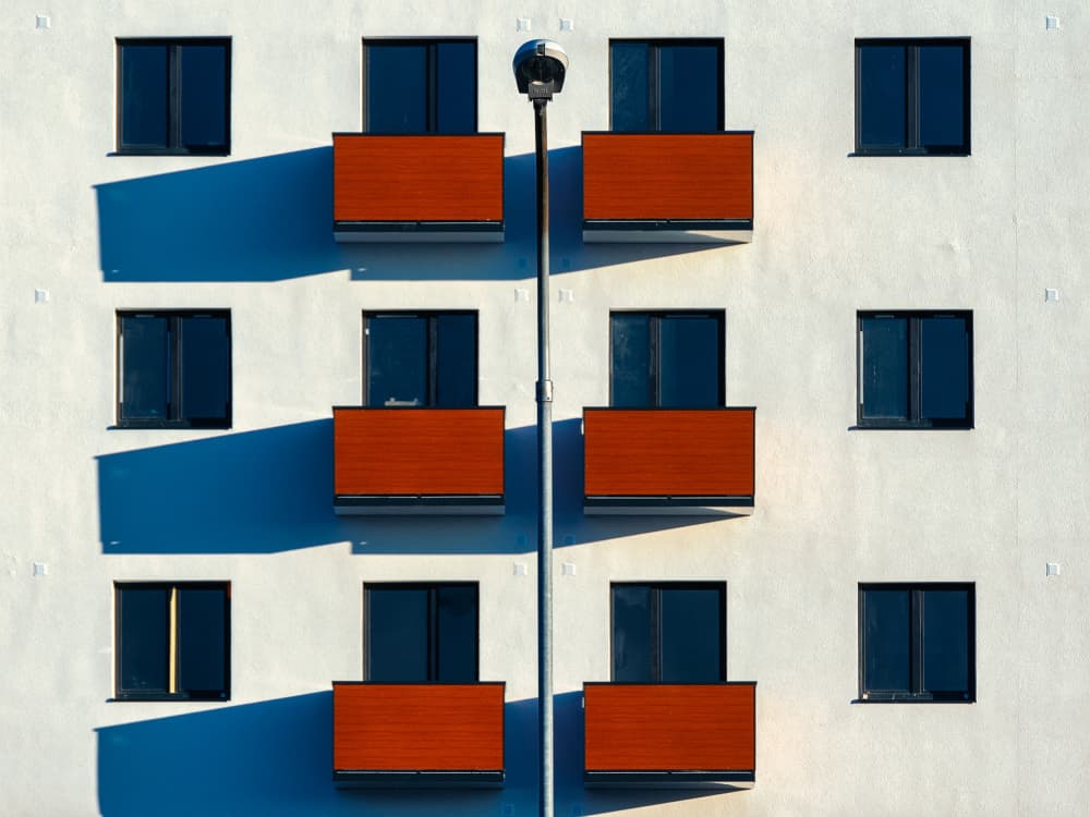 Geometric Building Shadows by Karol Važan — canvas wall art