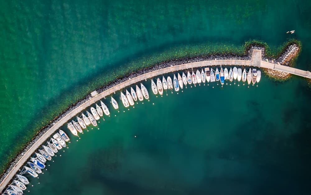 Curved Marina Aerial View by Wei (David) Dai — canvas wall art