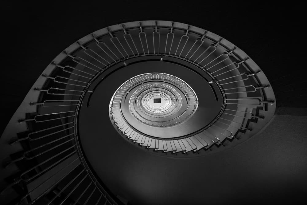 Hypnotic Spiral Staircase by Jacqueline Hammer — canvas wall art