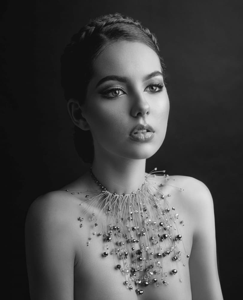 Elegant Woman With Necklace by Adalia Fedur — canvas wall art