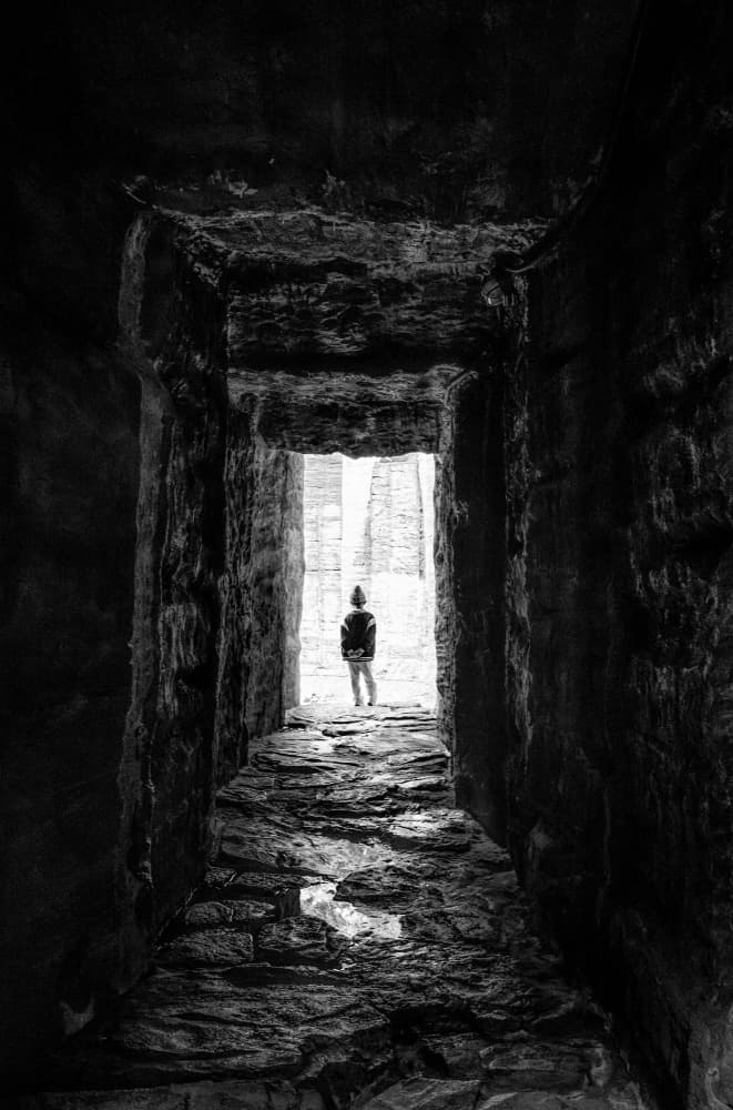 Lone Figure Archway Light by Bong Goo Kang — canvas wall art
