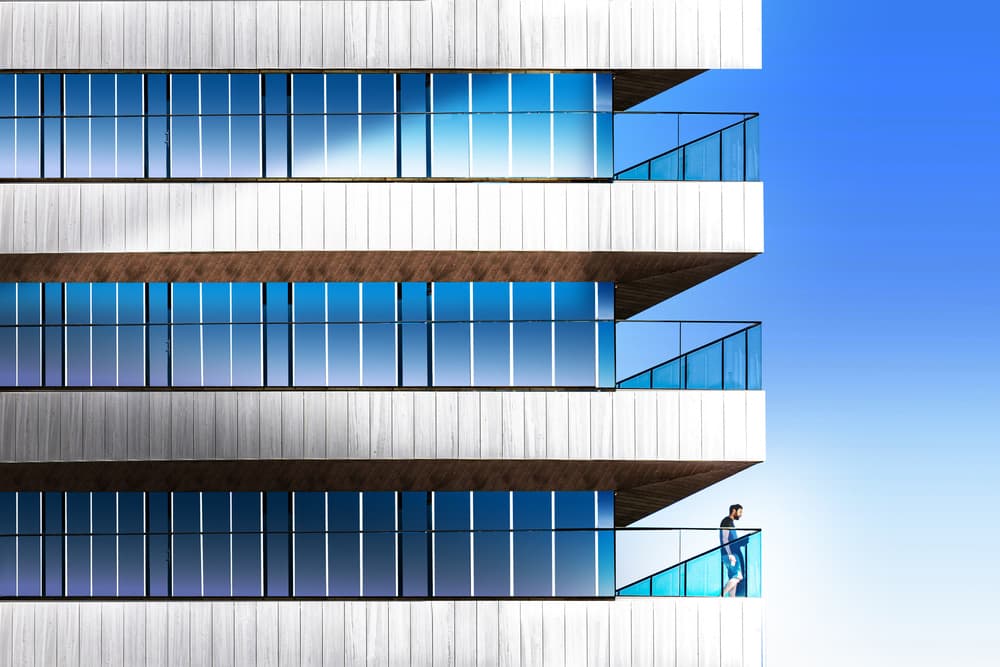 Man on Modern Balcony by Anita Martin AnnaPileaFotografie — canvas wall art