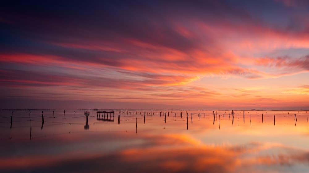Vibrant Sunset Reflections by Gustavo Ribes — canvas wall art