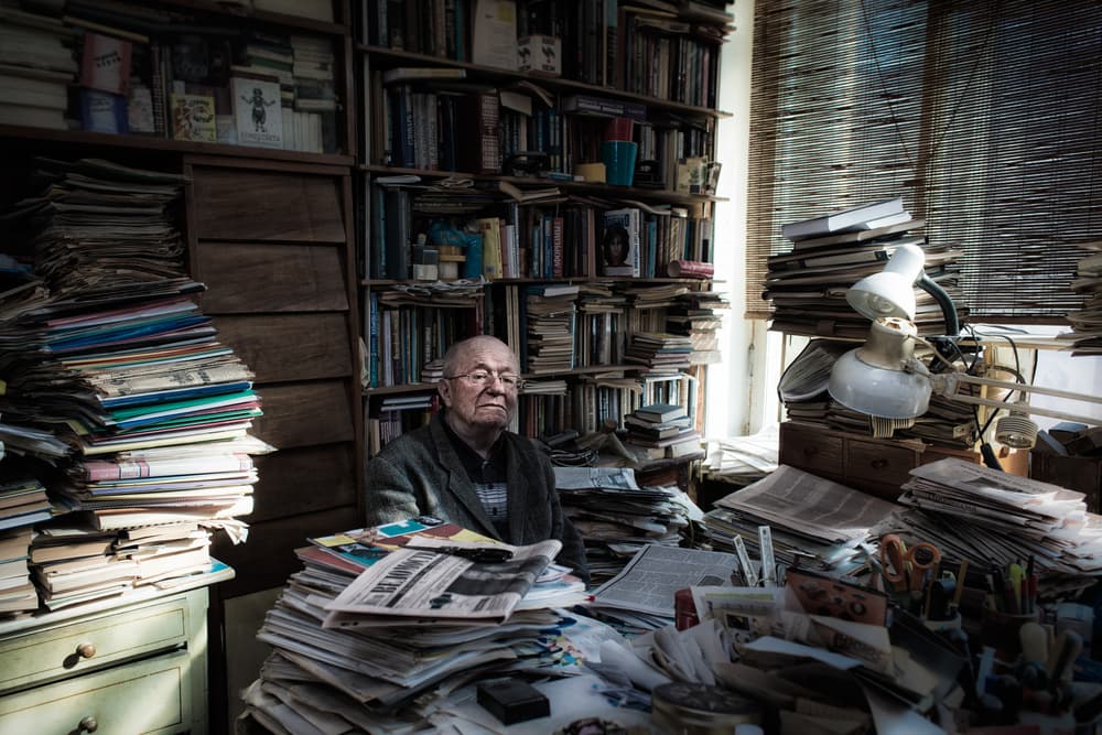Man Surrounded By Books by Konstantin Selezenev — canvas wall art