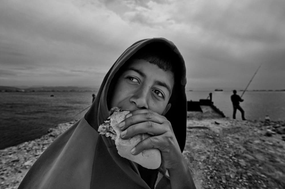 Hungry Boy By Sea by nebula — canvas wall art