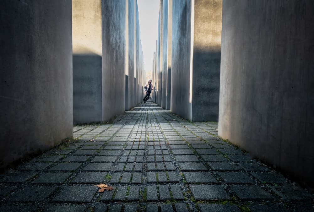 Man Walking Concrete Passage by Michel Groleau — canvas wall art