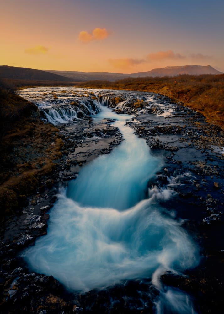 Blue River Cascade Sunset by Tony Xu — canvas wall art
