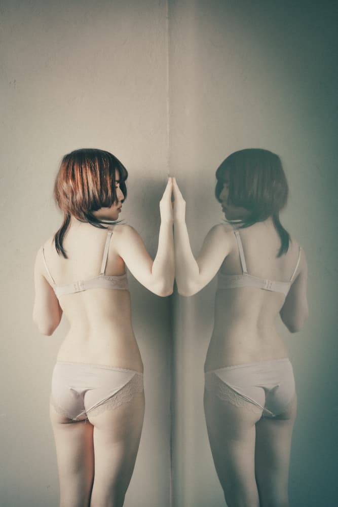 Woman's Quiet Reflection by Kurosaki Sangan — canvas wall art