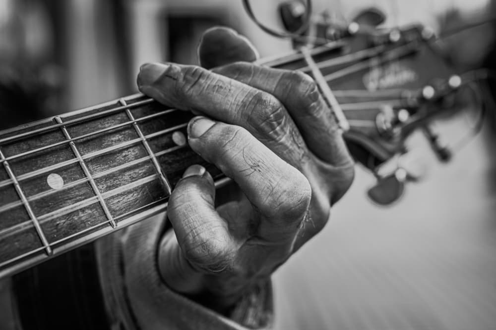 Musician's Hand on Guitar by PacodlaCorte — canvas wall art