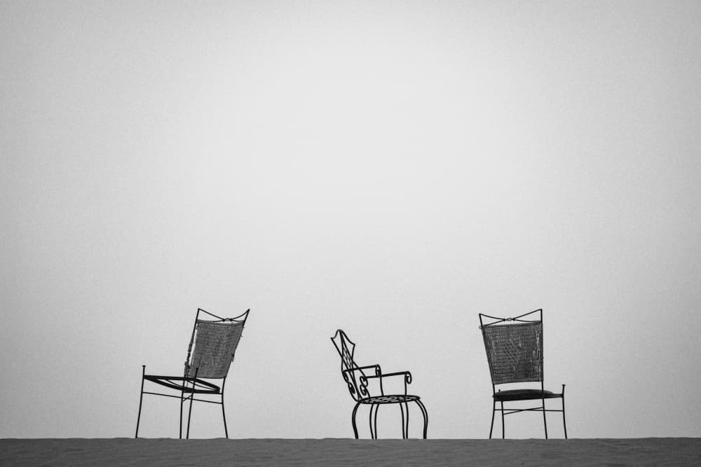 Desert Chairs in Solitude by Gina Buliga — canvas wall art