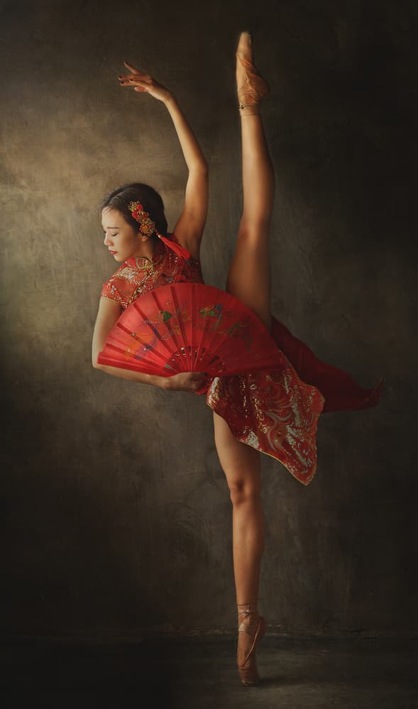 Red Fan Ballet Dancer by Sebastian Kisworo — canvas wall art