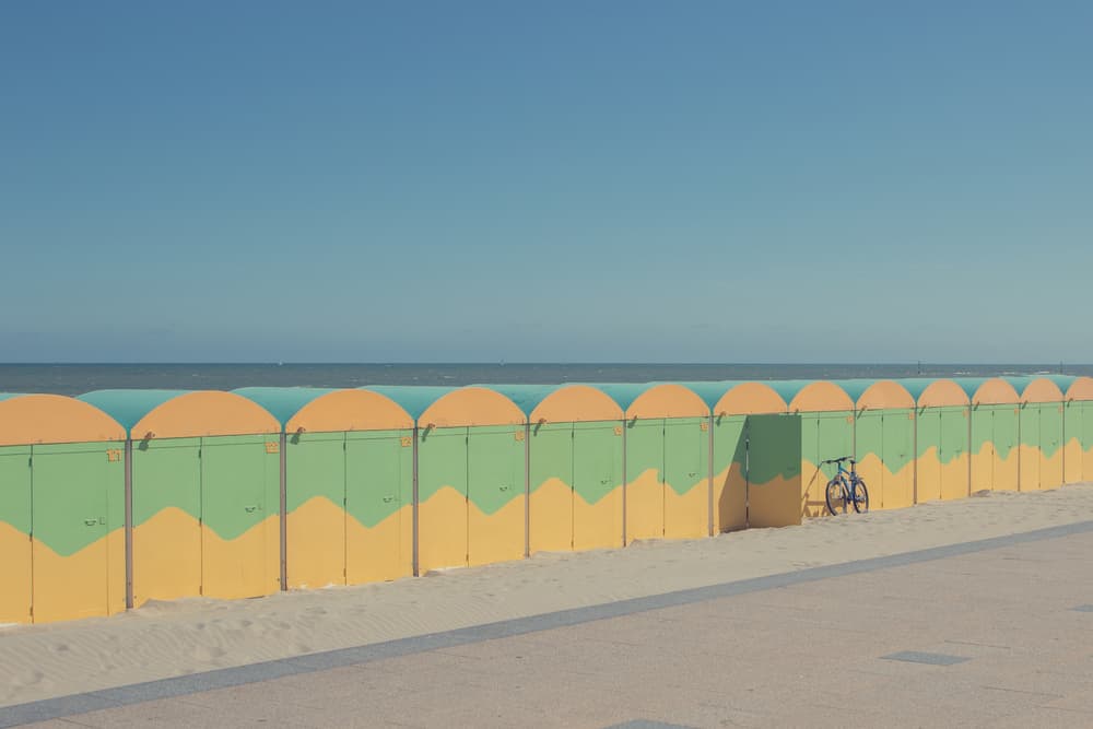 Colorful Beach Huts Bicycle by Massimo Della Latta — canvas wall art
