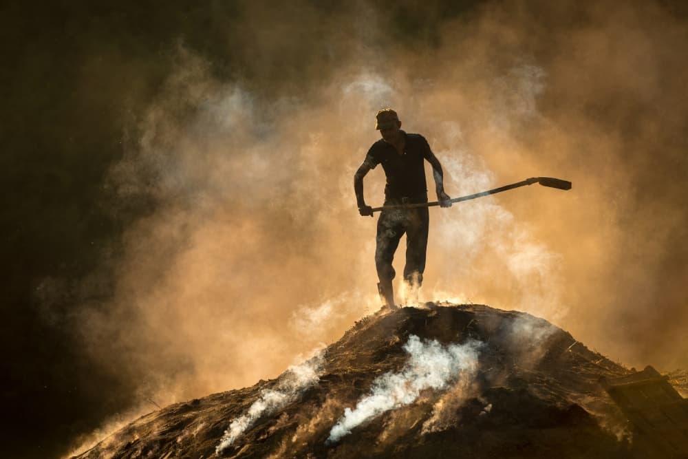 Worker in Golden Smoke by Lucian Constantin — canvas wall art