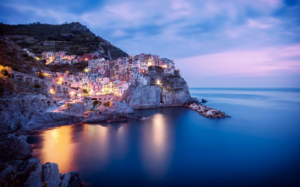 Charming Cliffside Village by Mike Kreiten — canvas wall art