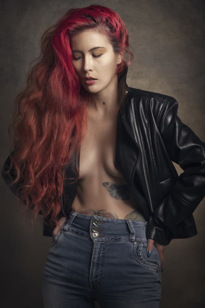 Red Hair Leather Woman by Cesar Tejada — canvas wall art