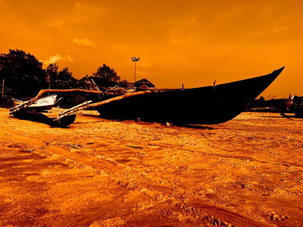 Orange Beach Boat by Santhosh ch — canvas wall art