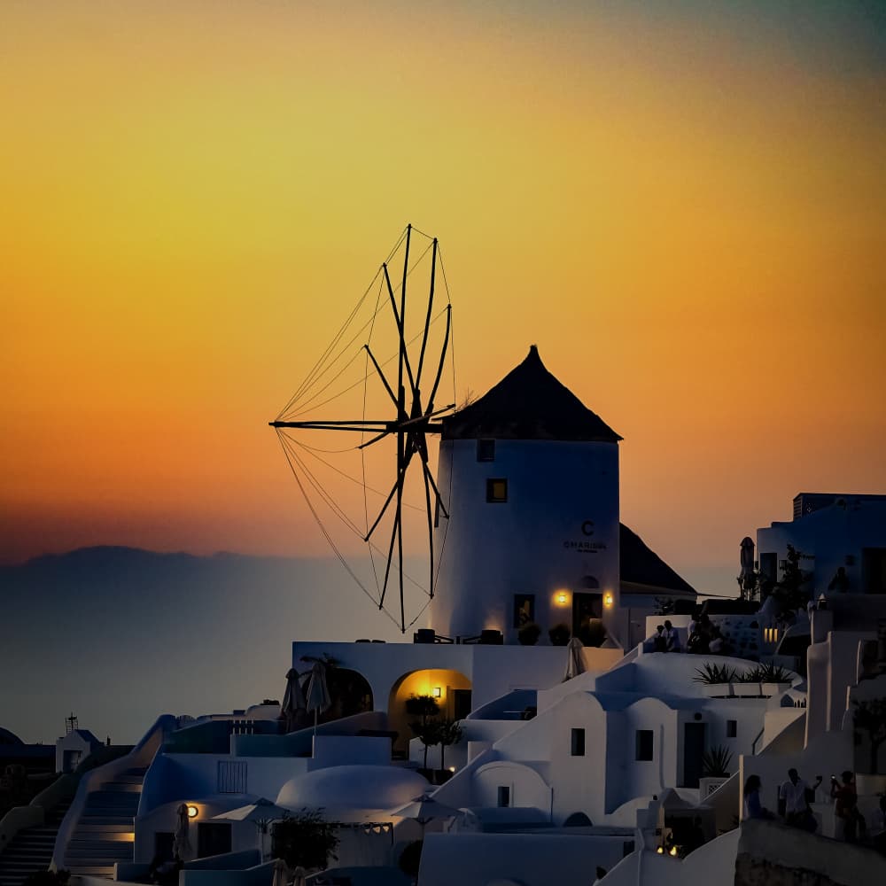 Santorini Sunset Windmill by Michel Romaggi — canvas wall art