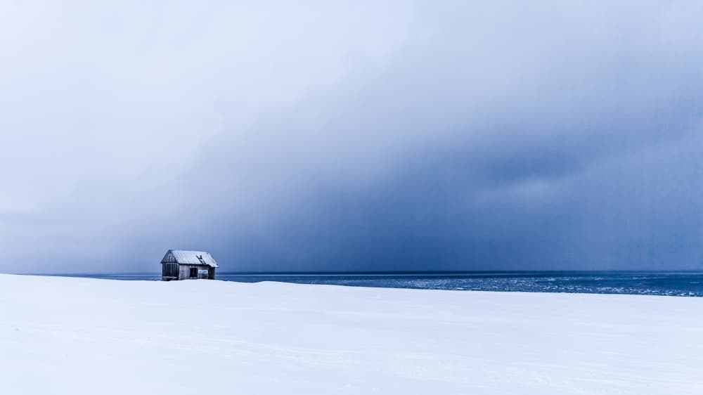 Isolated Winter Cabin by Åsmund Kværnstrøm — canvas wall art