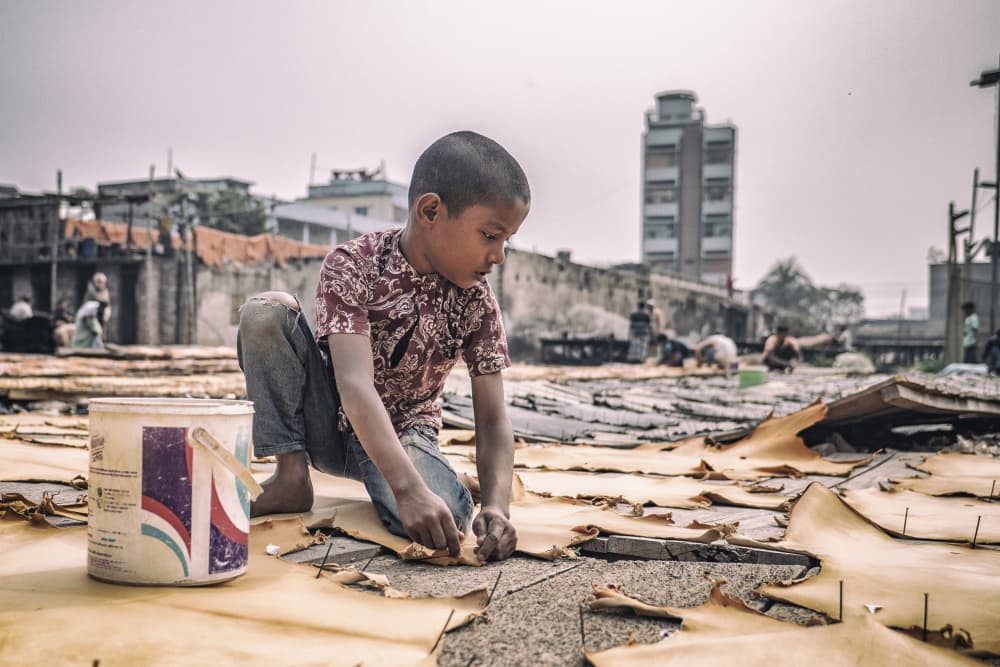 Barefoot Boy Working by Marcel Rebro — canvas wall art