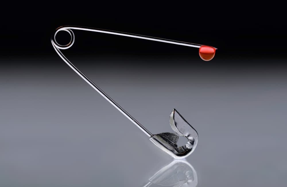Crimson Droplet Safety Pin by Peter Davidson — canvas wall art