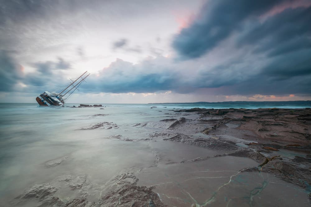 Moody Shipwreck Coast by Daniele Atzori — canvas wall art