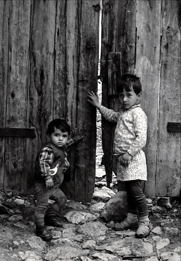 Innocent Boys Wooden Gate by Garik — canvas wall art