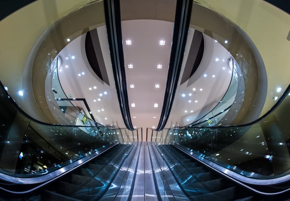 Modern Escalator Curves by Marc Pelissier — canvas wall art