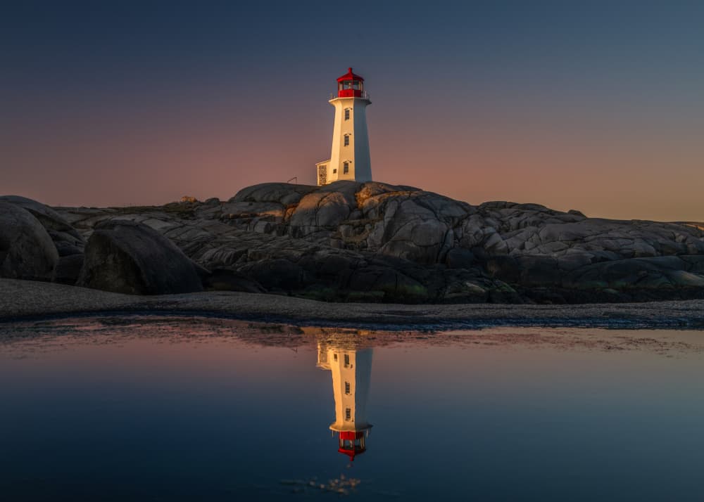 Sunset Lighthouse Reflection by Ambar Saha — canvas wall art