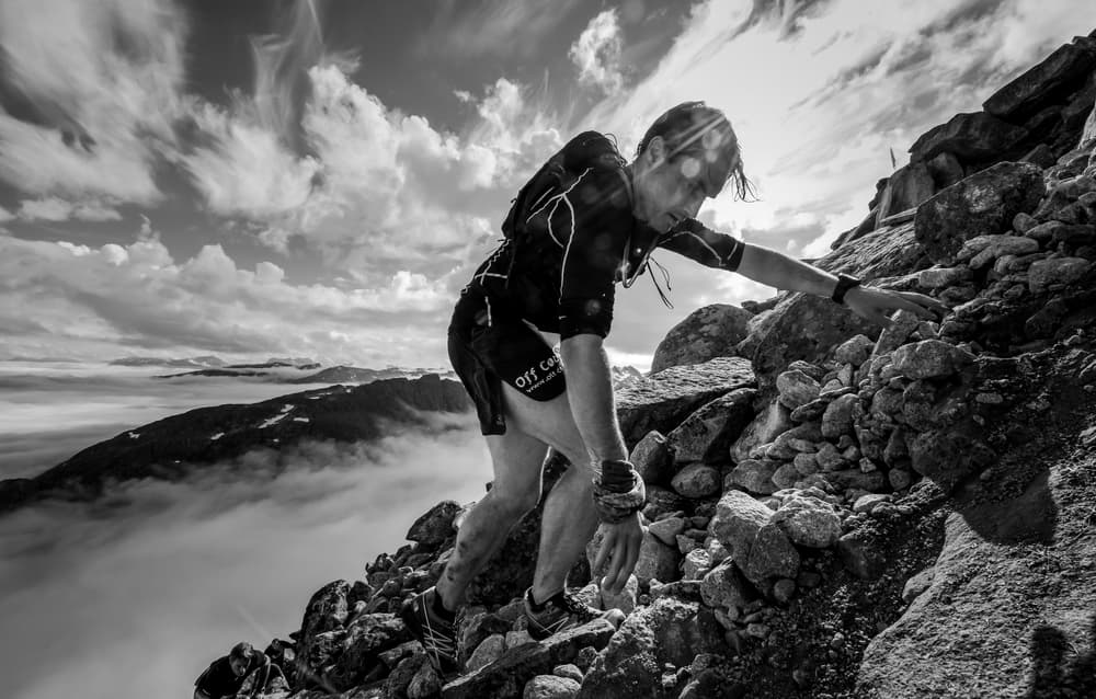 Trail Runner Above Clouds by Zoltan Tot — canvas wall art