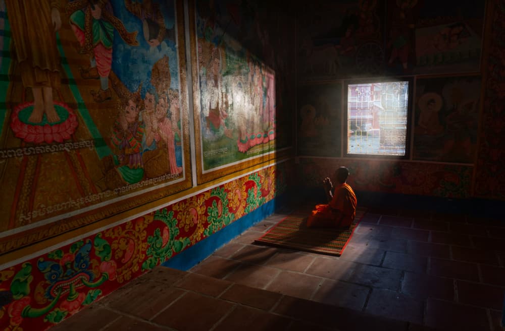 Monk in Temple Light by Tran Van Truong — canvas wall art