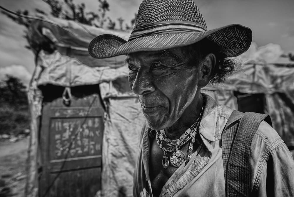 Man in Straw Hat by PAUL GOMEZ — canvas wall art