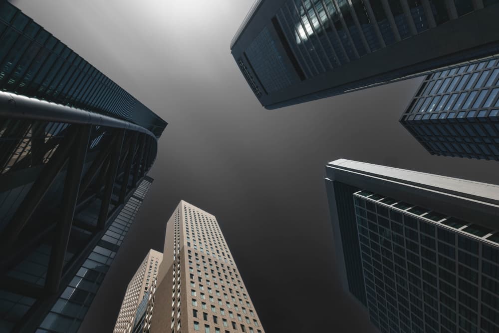 Towering City Architecture by Mizuki — canvas wall art