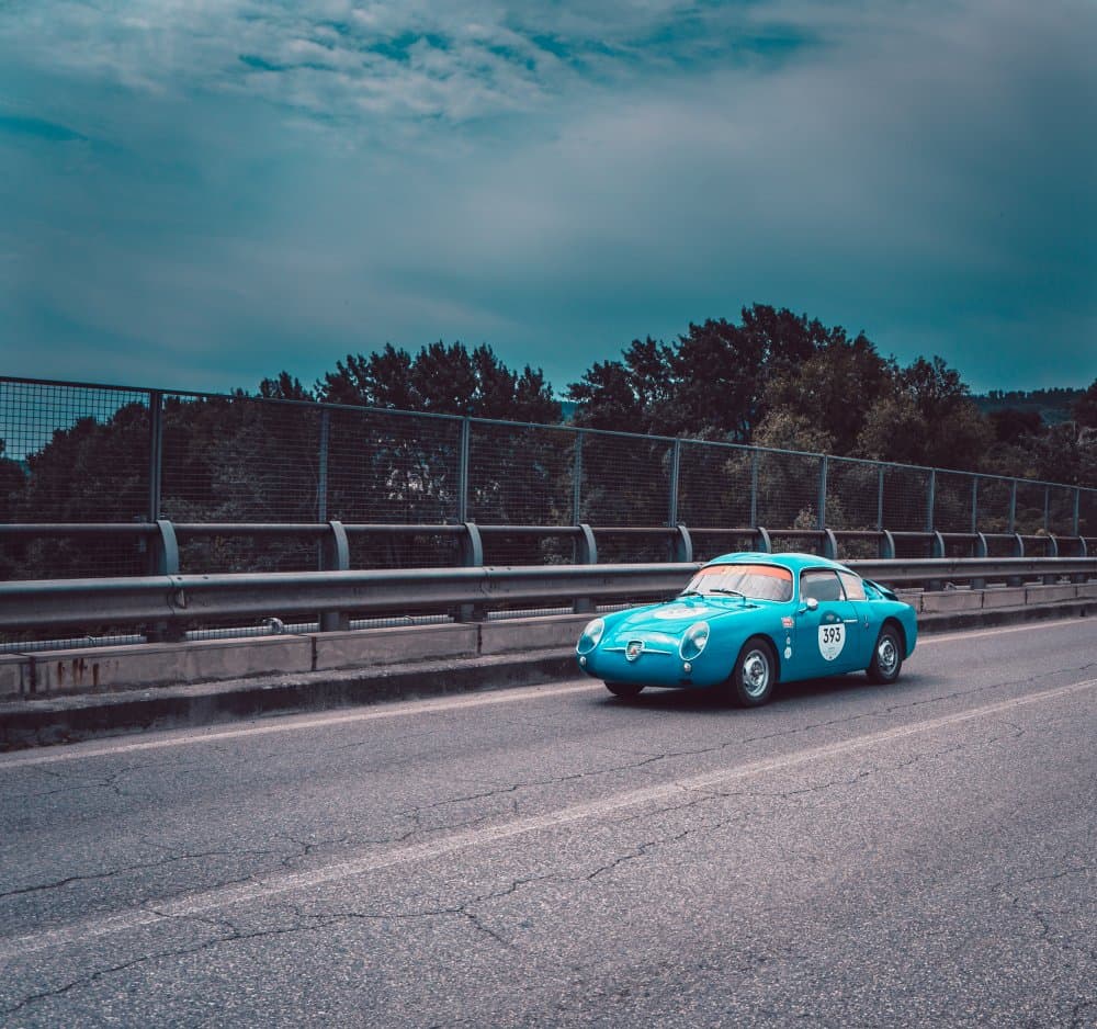 Vintage Teal Race Car by Federico Battistoni — canvas wall art