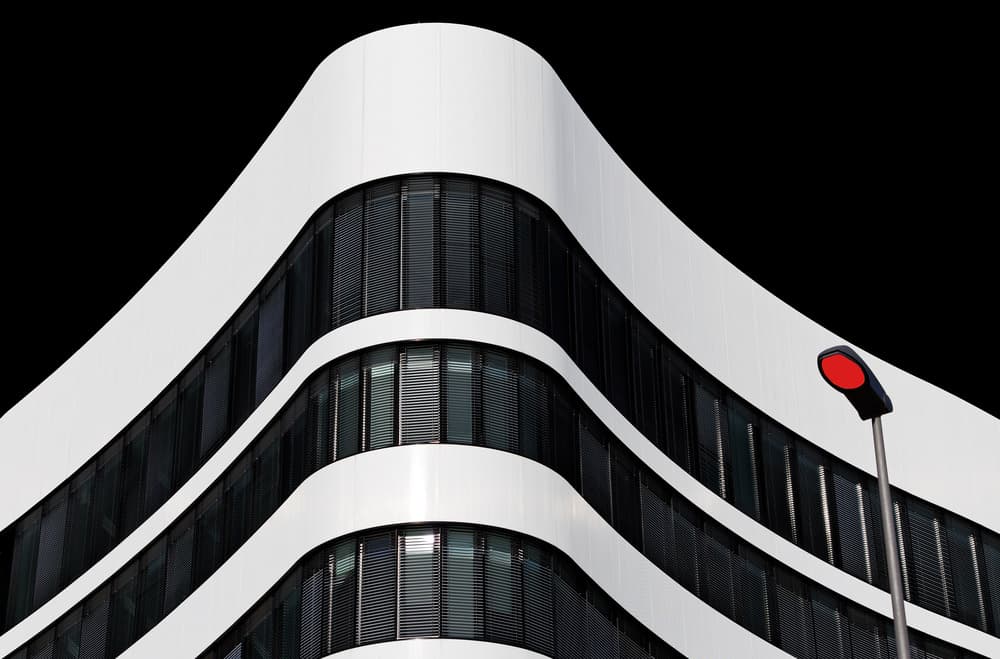 Sleek Curved Building by Martin Fleckenstein — canvas wall art