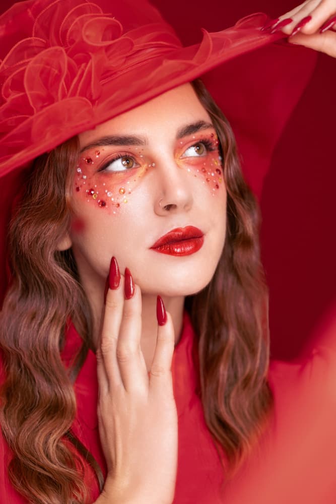 Red Hat Beauty by Sharon Levy — canvas wall art