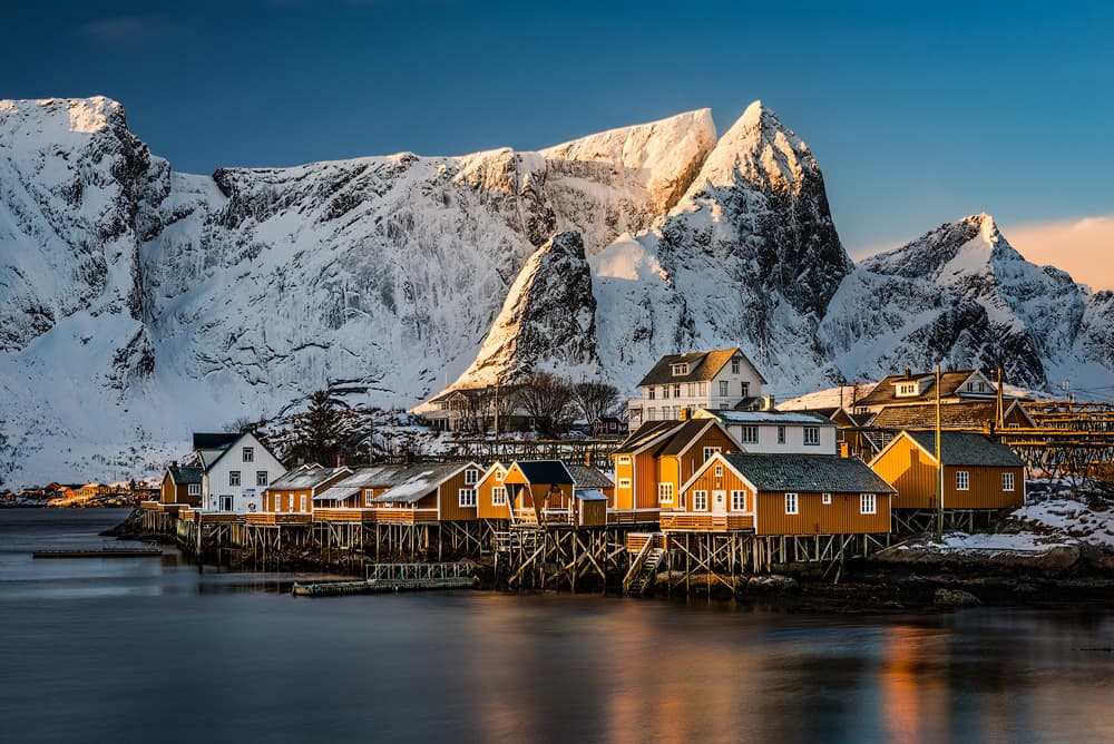 Golden Winter Village by Raymond Hoffmann — canvas wall art