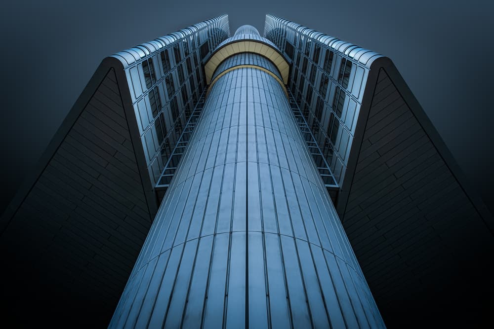 Soaring Blue Skyscraper by Rolf Endermann — canvas wall art