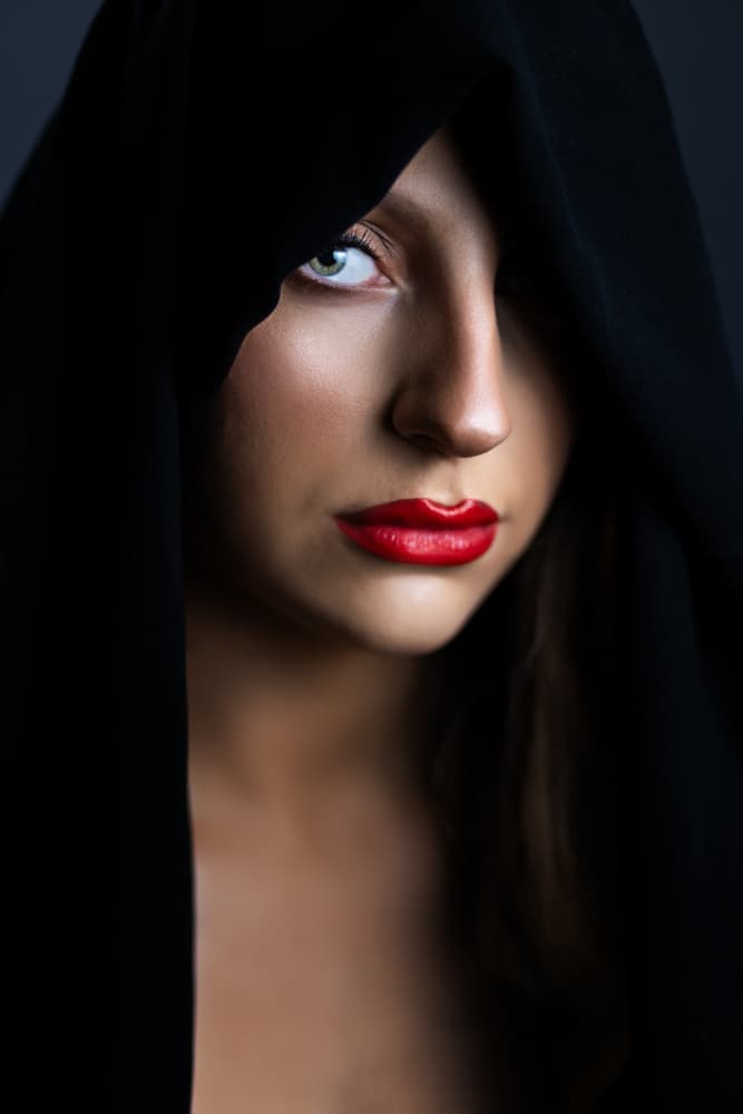 Mysterious Hooded Woman by Hardik Pandya — canvas wall art